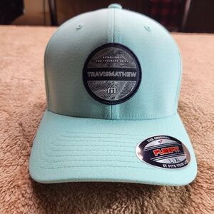 TravisMathew Mint Green Cap In a Size L/XL.
